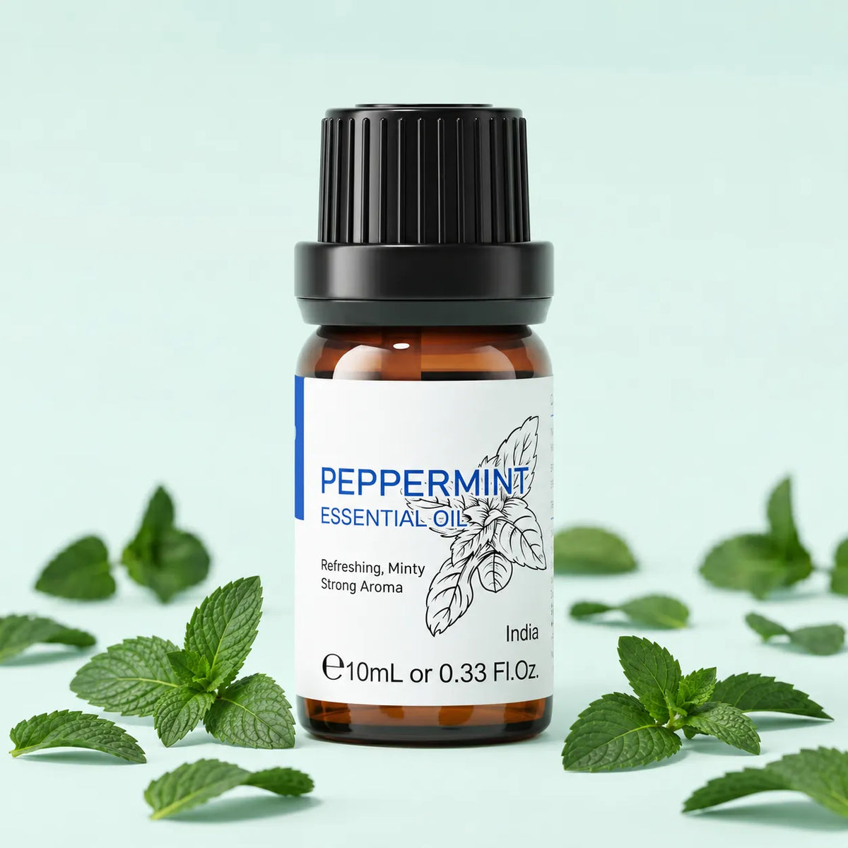 HIQILI Peppermint Essential Oil 10 mL amber bottle with fresh mint leaves