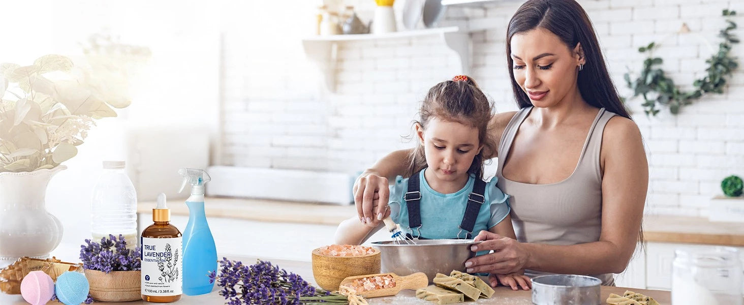 Mother and daughter making handmade soap and bath bombs with pure true lavender essential oil and Himalayan salt scrub for DIY family time and quality time.
