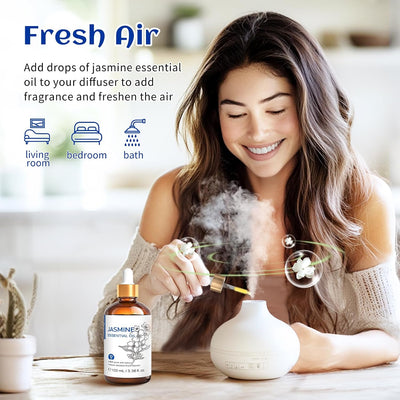 Woman enjoying a jasmine essential oil diffuser in a bright room for fresh air