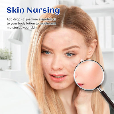 Woman applying diluted jasmine essential oil to her face as part of a skin care routine