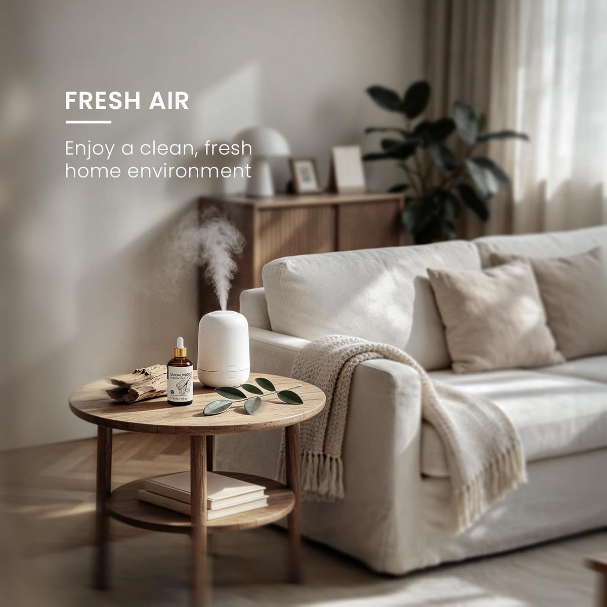 Mist diffuser freshening a living room with HIQILI Sandalwood Essential Oil