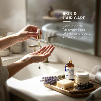Hands pouring HIQILI True Lavender Essential Oil into a DIY skin and hair care blend at a bathroom sink