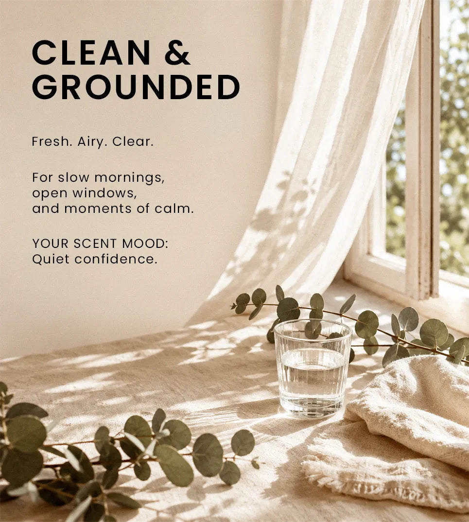 Clean and grounded fragrance mood featuring fresh air, eucalyptus leaves, natural light, and a calming minimalist home setting