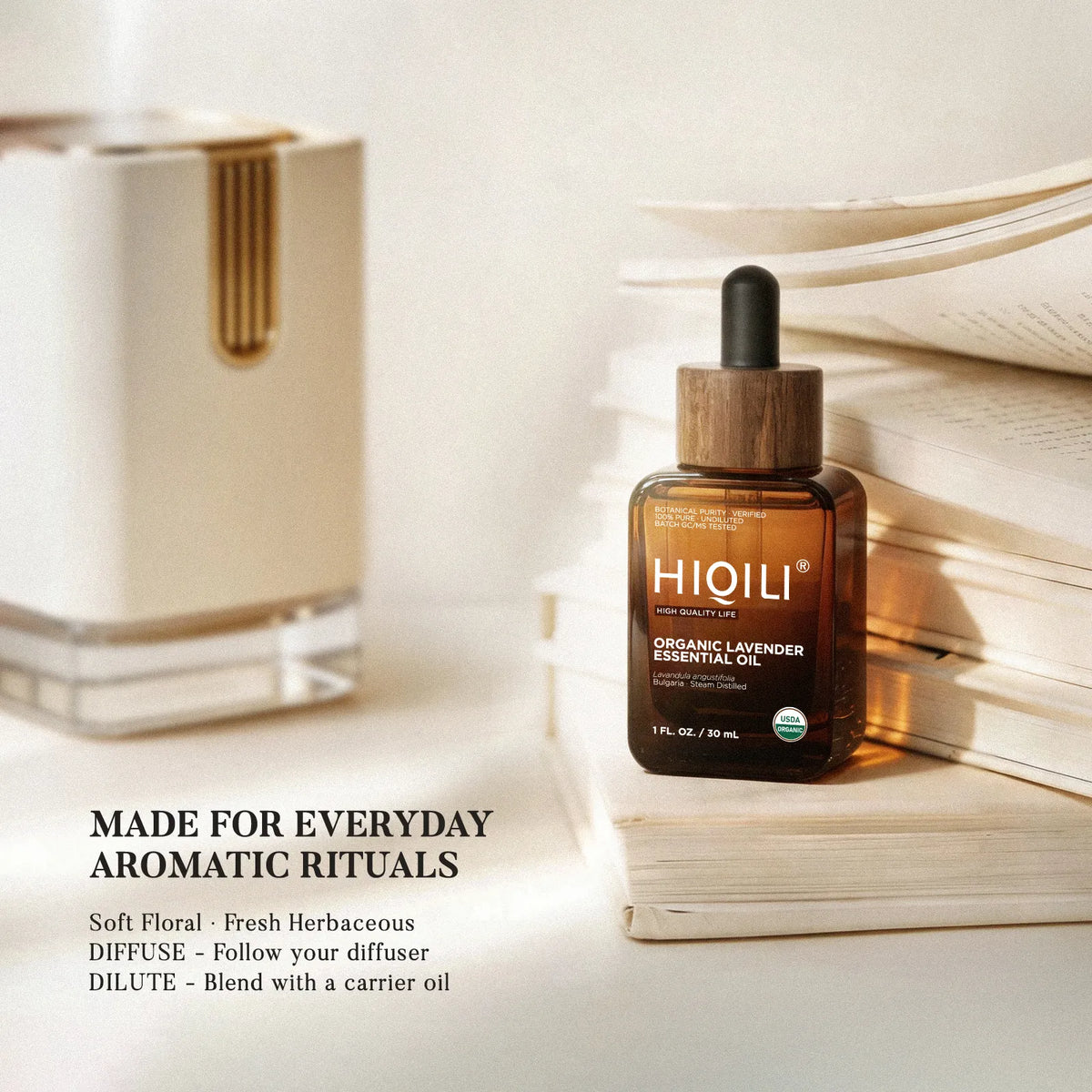 HIQILI 30 mL organic lavender essential oil beside a diffuser and books for an everyday aromatic ritual