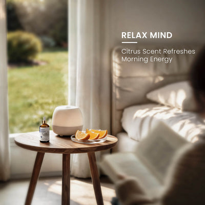 HIQILI Sweet Orange Essential Oil used with an aroma diffuser to refresh the senses, relax the mind, and boost morning energy.