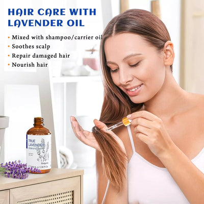HIQILI Smiling woman applying True Lavender Essential Oil to her hair ends with a dropper to nourish and repair damaged hair.