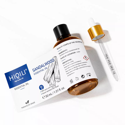 HIQILI 30ml Sandalwood Essential Oil expanded label and glass dropper with precise measurement markings.
